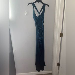 Selling my prom dress, worn once of course, I don’t need it anymore